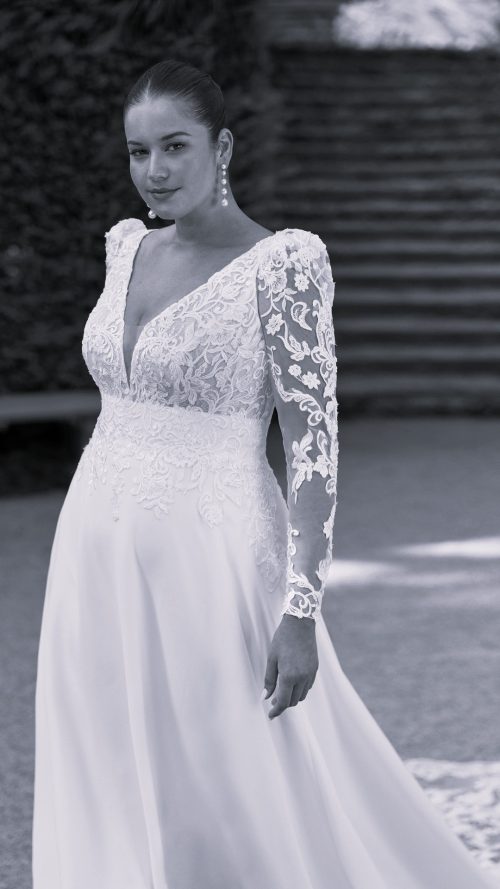 Los vestidos de novia en tallas grandes (curvy) favorecen a las siluetas con curvas mediante cortes estratégicos como la línea A, el corte imperio o los estilos cruzados (wrap), los cuales marcan la cintura y alargan la figura con elegancia