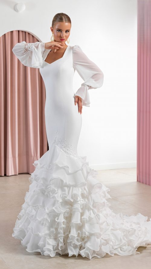 Vestido de novia estilo flamenco con falda de volantes.